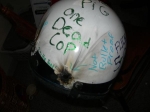 Artwork --- One Dead Cop: Police Helmets, Apparently, Are Not Bullet Proof (Anti-Police and Anti-Cop Directory | Description : Raleigh Rebel claims responsibility for all copyri... | Tags : N/A.) ::: By Raleigh Rebel (About: N/A | Ideals: N/A)